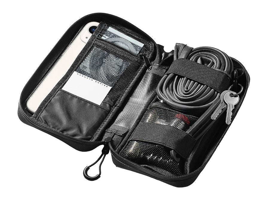 Mammoth Empire cycling wallet opened out, showing phone, cards, key, spare tube, tyre levers and multitool